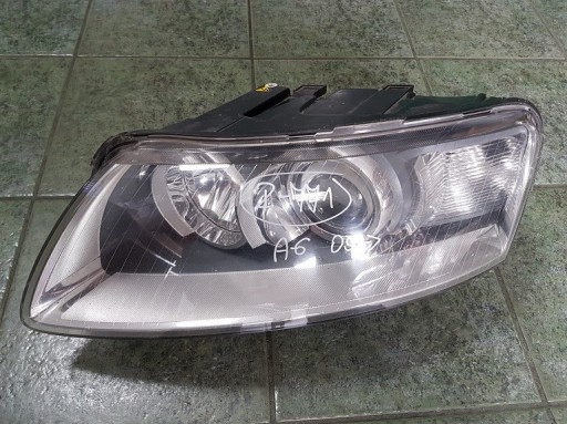 EMU REFLEKTOR LAMPA XENON AUDI A6 C6 4F0 LEWY 04-
