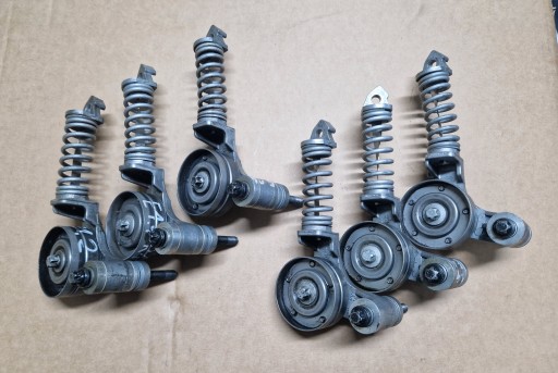 OPEL ASTRA J CORSA E D MERIVA NAPINACZ PASKA KLINOWEGO ROLKA 25195388 OE GM