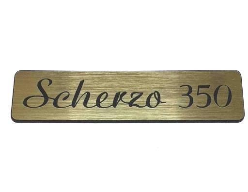 Emblemat TONSIL SCHERZO 350 złota 80x20mm