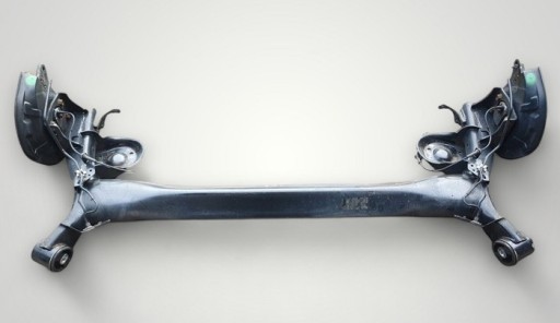 NISSAN QASHQAI J11 2014-2020 PIASTA OŚ BELKA TYLNA ZAWIESZENIA