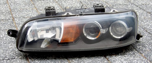 FIAT PUNTO II REFLEKTOR LEWY (50)