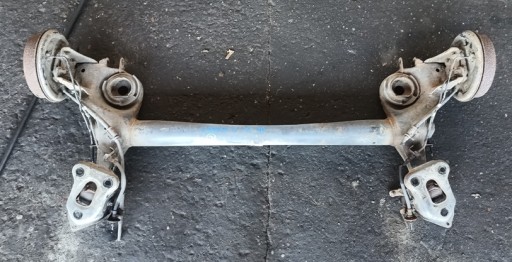 OPEL CORSA D 08r BELKA OŚ ZAWIESZENIA TYŁ