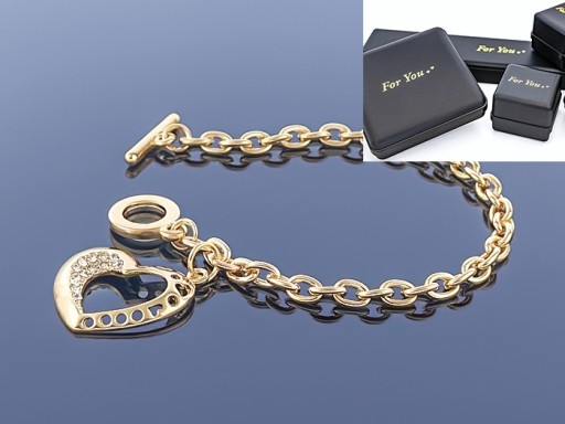 Złota bransoletka Charms