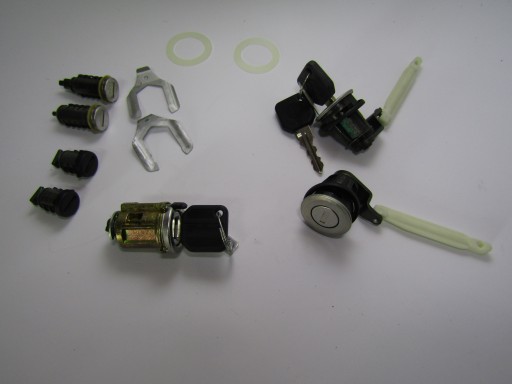 112830380 - КОМПЛЕКТ ВСТАВОК ДВЕРНИХ ЗАМКОВ ALFA ROMEO 155 ОРИГ