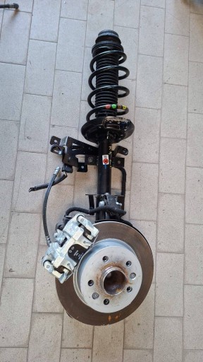 McPherson swing shock absorber rear part side left Renault 5 E-Tech 562103560R