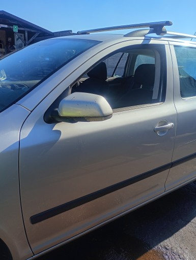 door left front front Skoda Octavia 2 II 04-13 code lakieru 9102