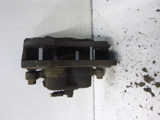 caliper brake + Jarzmo front right Mitsubishi Outlander and 2.4b 2004r.