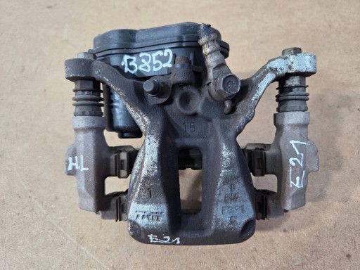 Toyota Corolla E210 E21 caliper brake rear left F391 (B852)