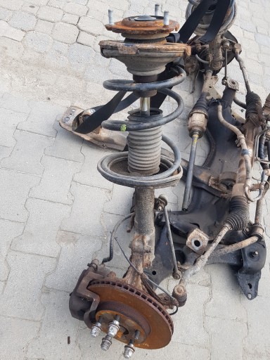 TOYOTA RAV4 II swing McPherson shock absorber spring front left