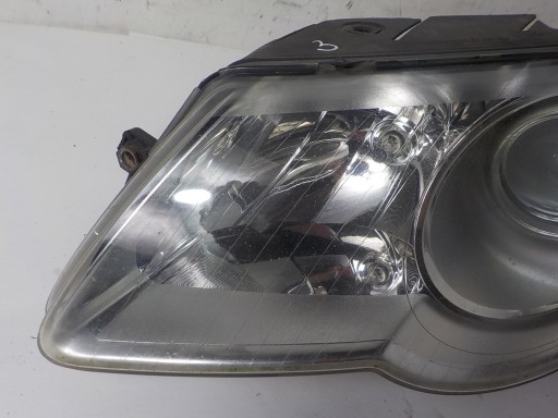 VOLKSWAGEN PASSAT B6 light left front front UK
