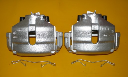 Затискачі лівий правий передній SKODA OCTAVIA 312/25 мм 04