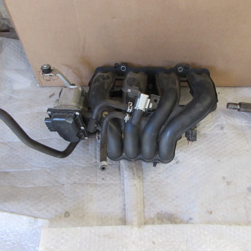 69L0 - ВПУСКНИЙ КОЛЕКТОР SUZUKI SWIFT MK 7 1,2 БЕНЗИН