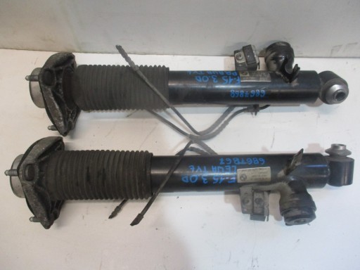 6867867 - Левый амортизатор bmw x5 f15 3.0d