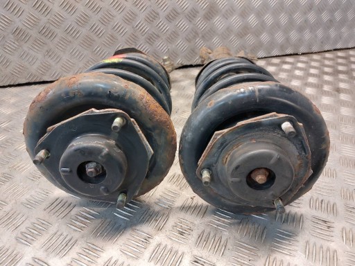 shock absorber spring left front right front NISSAN PRIMERA P12