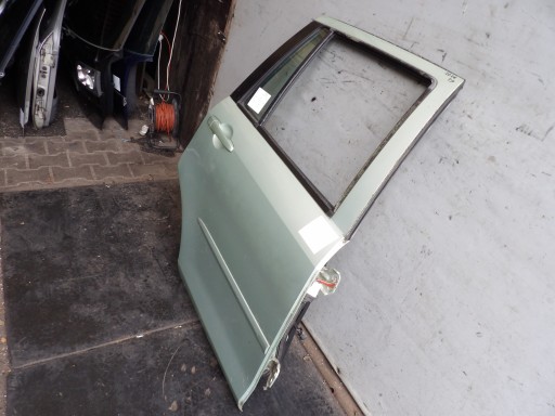 Mazda Demio II door rear. right HB 5D