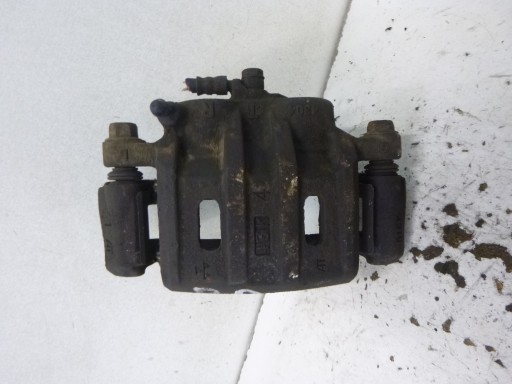 caliper brake + Jarzmo front right Mitsubishi Outlander and 2.4b 2004r.