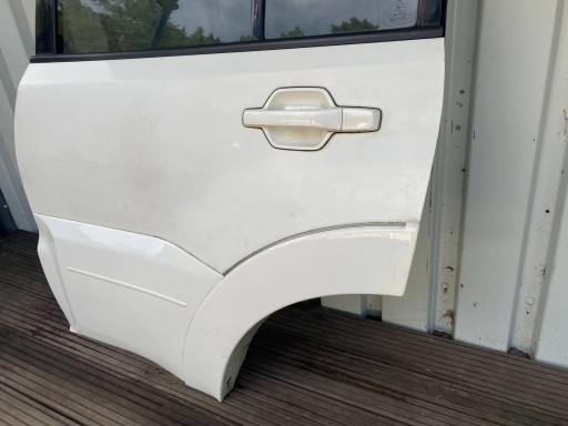 MISTUBISHI PAJERO IV 5D complete door left rear part rear. BIALY