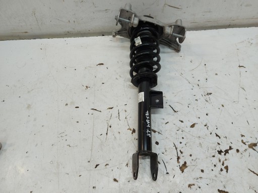 TESLA MODEL Y 2023r shock absorber front left 2WD 1188364-00-C