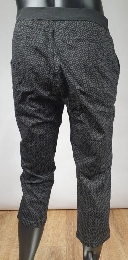 Raphaela Spodnie materia\u0142owe czarny-bia\u0142y Na ca\u0142ej powierzchni Elegancki Moda Spodnie Spodnie materiałowe 