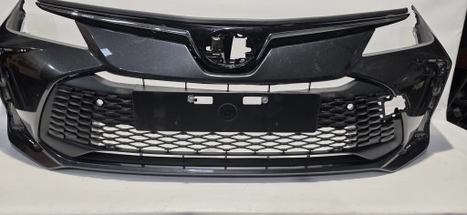 Frontstoßstange Grill TOYOTA COROLLA E21 Sedan LIFT 22- PDC Original 52119