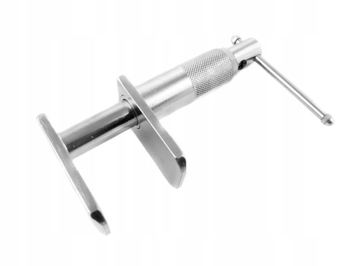 ІНСТРУМЕНТ ДЛЯ ЗАТИСКУ ГАЛЬМІВНИХ ПОРШНІВ