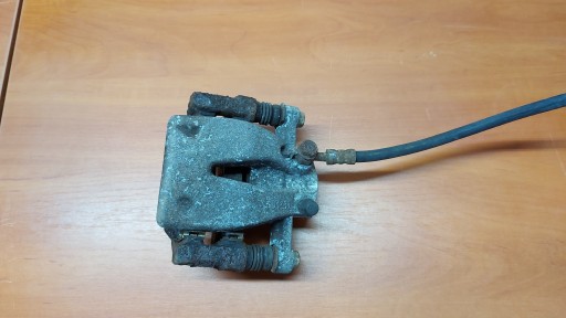 caliper brake left rear part TOYOTA AVENSIS T25 COROLLA VERSO 2,2 177KM