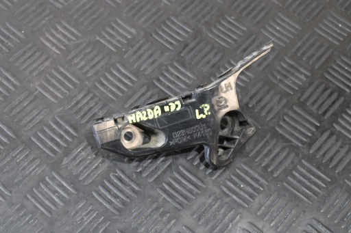 Support Support plaque Pare choc Gauche Avant D23N500U1 MAZDA 2 II DJ LIFT