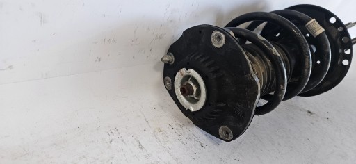shock absorber left front OPEL ASTRA V K 39039563