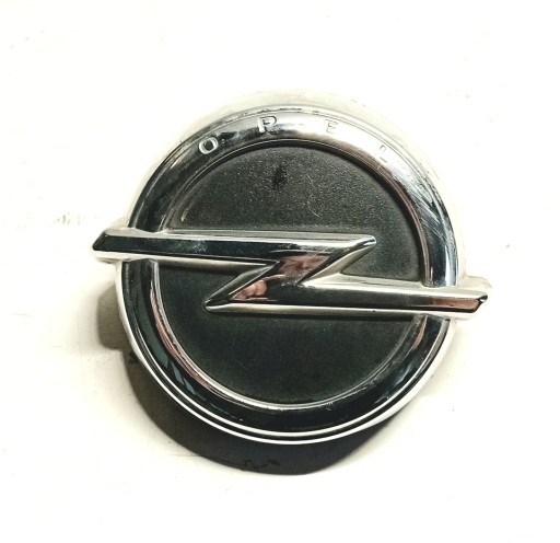 EMBLEMAT LOGO bonnet rear part OPEL CORSA E 39007842