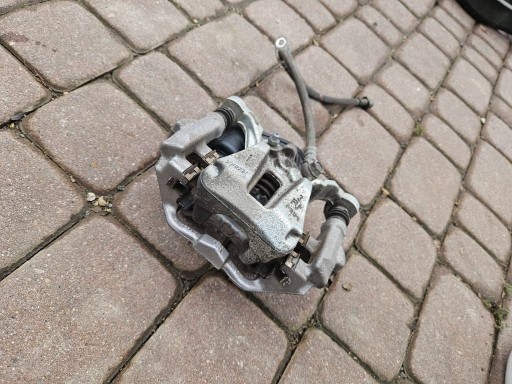 46310-F4011 caliper rear part rear right left brake Toyota Corolla E210 E21