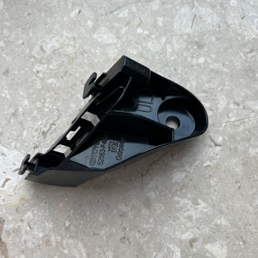 TOYOTA C-HR 16 - 23 holder of a bumper support left 52563-F4010