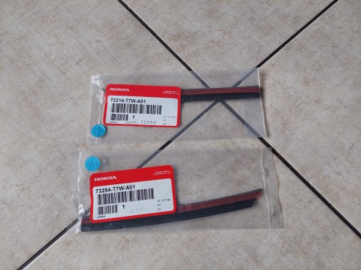 73254-T7W-A01 73214-T7W-A01 - УЩІЛЬНЕННЯ СКЛОПІДІЙМАЧА БАГАЖНИКА - HONDA HR-V II-15-21