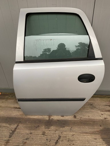OPEL MERIVA A complete door left rear part rear. silver