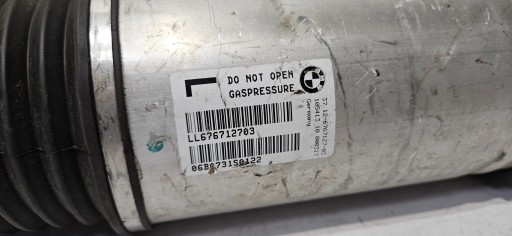 tlumič PNEUMATYCZNY pravý levý záď BMW 7 E65 E66 E67 originál 6767127