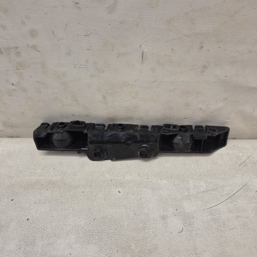 DACIA SANDERO III 3 20-> bracket holder support left rear part