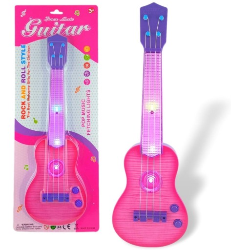 ДИТЯЧА РОК-ГІТАРА СЯЄ НА СТРУНАХ ІНСТРУМЕНТУ