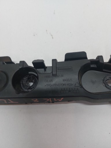 support holder of a bumper left rear part FORD FIESTA MK8
