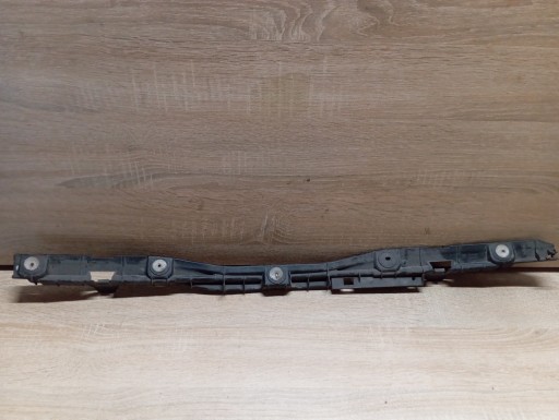 bumper bracket rear part central Opel Astra H Kombi 24460477