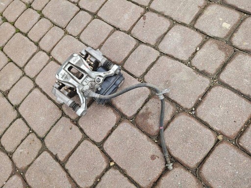 46310-F4011 caliper rear part rear right left brake Toyota Corolla E210 E21