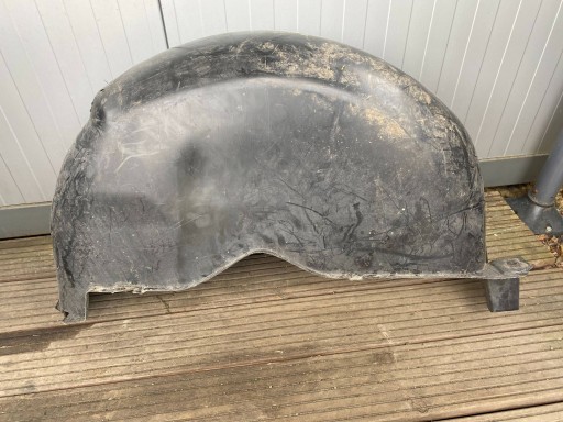 VW T5 LIFT mudguard right rear part rear. 7H0810972C