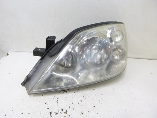 light front Nissan Primera P12 2002r. HELLA 1EJ 238 010-01