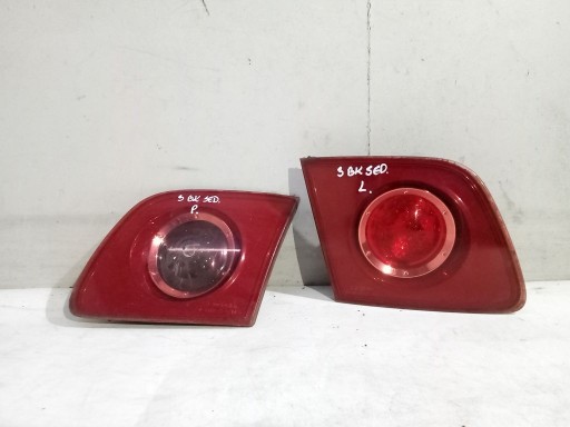 Mazda 3 and BK sedan lights right and left rear part rear. to the bonnet