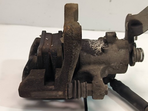 caliper brake rear part left SKODA OCTAVIA III