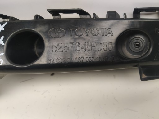 22R- Toyota Aygo X support holder of a bumper rear part left original 52576-0H050