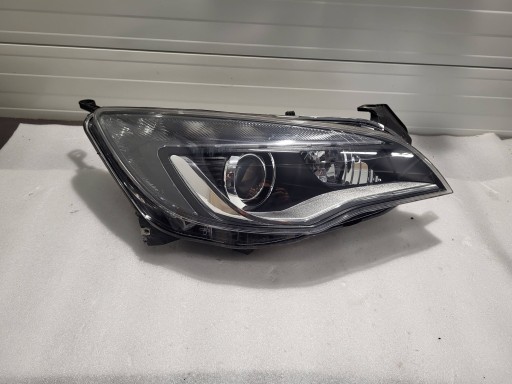 Opel astra j iv ксеноновая лампа правая передняя 1zt010012