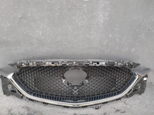 KB8B-50712 - MAZDA CX5 II 17- ХРОМИРОВАННАЯ РЕШЕТКА ПЕРЕДНЕЙ КАМЕРЫ ОРИГИНАЛ