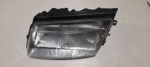 PASSAT B5 REFLEKTOR ľavý Svetlo predok