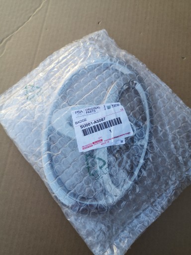 9811709777 - ЛОГОТИП-ЭМБЛЕМА TOYOTA PROACE SU001-A5087 НОВЫЙ ОРИГИНАЛ