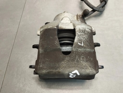 Audi A1 1.6 TDI caliper left front