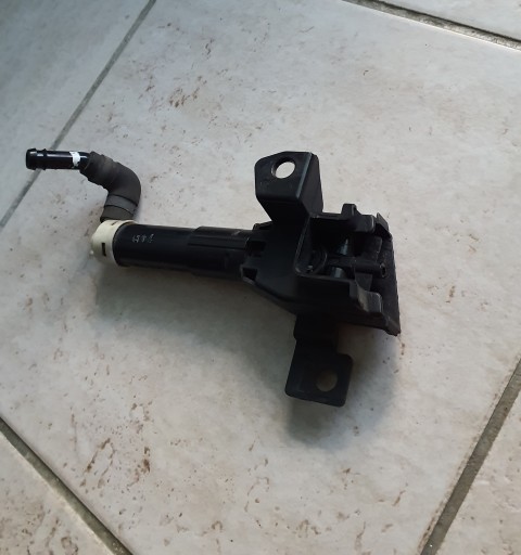 87937 - Citroen C-Crosser Омивач лампи правий